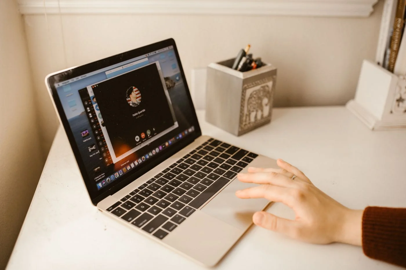 A video call is started on a laptop.